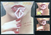 2EAA7F69-twisted-sister-s-love-is-for-suckers-copy-2.jpg