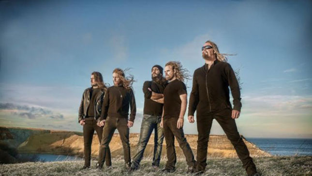 ONE MACHINE Featuring Guitarist STEVE SMYTH Release Official Lyric Video For  "New Motive Power" 