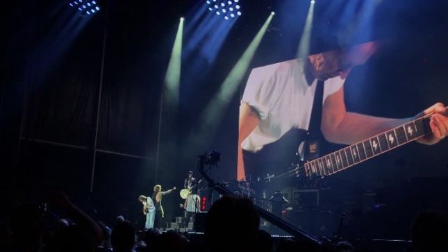 AC/DC Guitarist ANGUS YOUNG Joins GUNS N' ROSES On Stage In Sydney; Fan-Filmed Video Of "Whole Lotta Rosie" And "Riff Raff" Posted