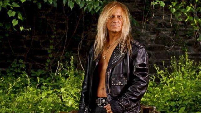 SAVATAGE / TRANS-SIBERIAN ORCHESTRA Guitarist CHRIS CAFFERY's Track-By-Track Look Back On Faces Solo Album - "Evil Is As Evil Does"