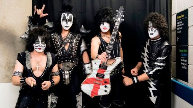 KISS Donate Custom Signed Guitar To Support Children's Hospital In The Wake Of Manchester Arena Attack