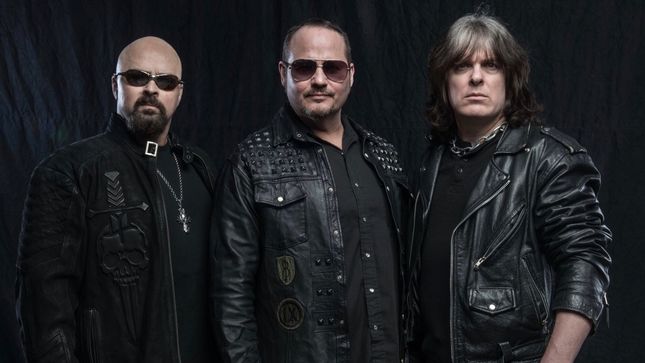 Exclusive: THE THREE TREMORS Featuring Present / Former Members Of JUDAS PRIEST, ICED EARTH, JAG PANZER, CAGE Premiere Debut Lyric Video “Invaders Of The Sky”