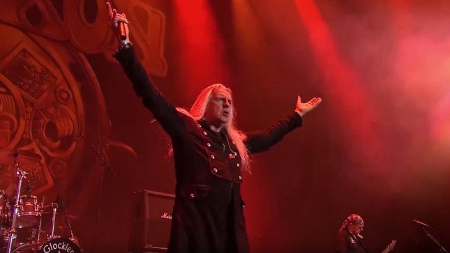SAXON Forced To Postpone Remaining 2019 Tour Dates; Frontman BIFF BYFORD To Undergo Heart Surgery (Video Message)