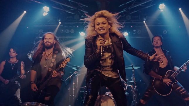 KISSIN' DYNAMITE Debuts Music Video For Cover Of POWERWOLF's "Let There Be Night"