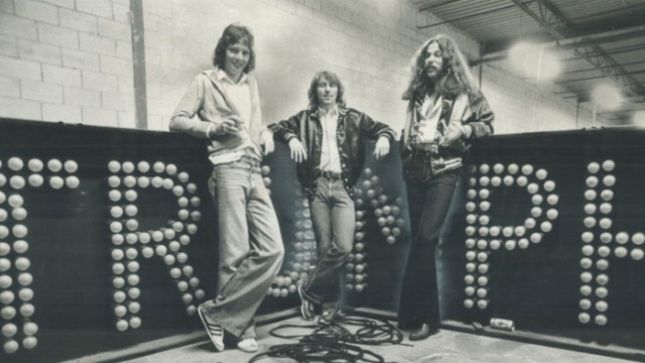 Former TRIUMPH Guitarist RIK EMMETT Weighs In On RUSH - "They Were Always A Bigger Thing Than Us, Breaking Other Markets And Playing All Over The World; We Owed A Lot To Them"