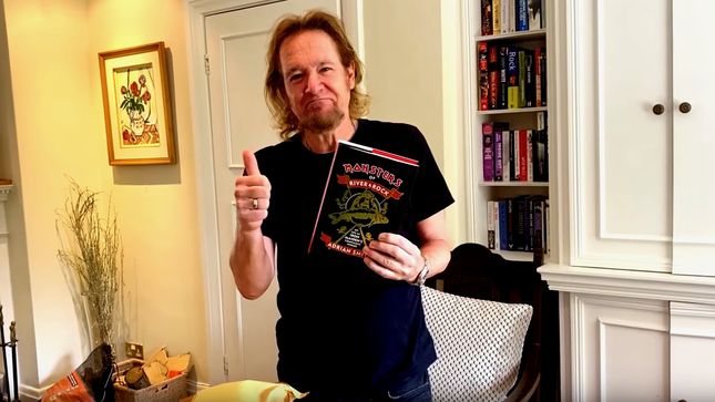 IRON MAIDEN Guitarist ADRIAN SMITH Receives First Copy Of Fishing Memoir, Monsters Of River & Rock; Unboxing Video