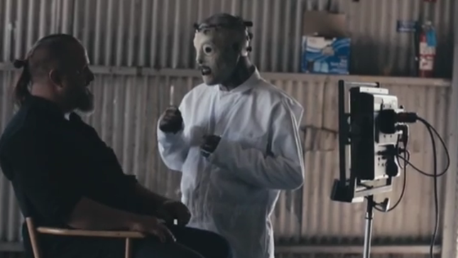 SLIPKNOT's Clown Takes Fans Behind-The-Scenes Of "The Devil In I" Video