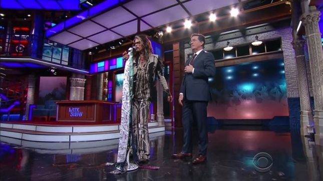 AEROSMITH’s STEVEN TYLER Demonstrates Mic Stand Techniques To Stephen Colbert; Video 