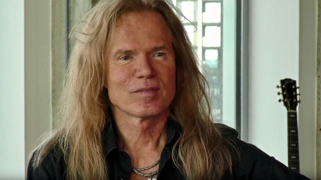 Guitarist ADRIAN VANDENBERG On Former WHITESNAKE Bandmate DAVID COVERDALE - “Sooner Or Later We Might Do Something Together”; Video