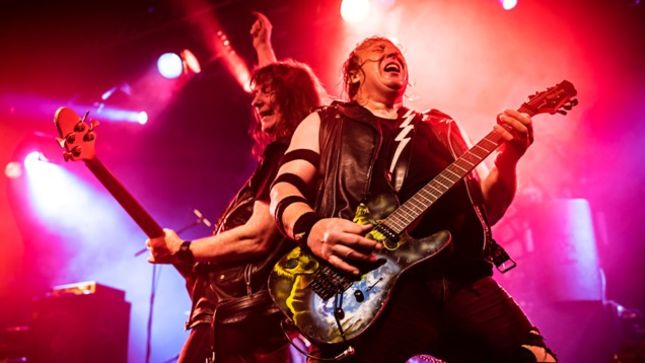 RAVEN Frontman JOHN GALLAGHER On Band's Iconic Logo - "I Was Looking At Logos Like JUDAS PRIEST And IRON MAIDEN..."; Audio