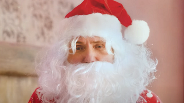 WHITESNAKE - DAVID COVERDALE Dresses As Santa Claus To Deliver Christmas Video Greeting