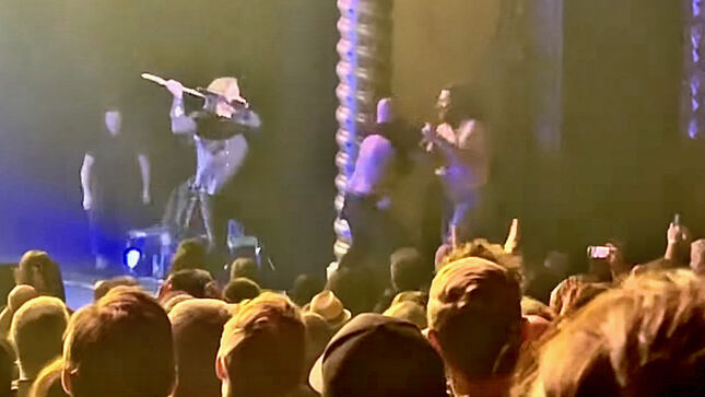 THE BLACK CROWES Fend Off Stage-Invading Fan With Mic Stand, Guitar; Video