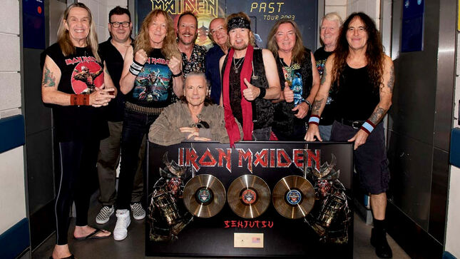 IRON MAIDEN - Warner Music UK Presents Band With Gold Disc For Over 100,000 Physical Sales Of Senjutsu Album